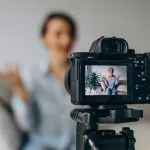 young-woman-blogger-recording-video-camera (1)